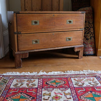 Early to mid-19th century mahogany two-drawer campaign chest viewed from the front