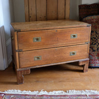 Early to mid-19th century mahogany two-drawer campaign chest viewed from the front