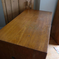 top of the Mid-19th century camphor wood two-part campaign chest with five drawers and recessed brass handles.