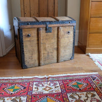 Antique Victorian pine domed trunk with iron straps and timber knock bars, circa 1880