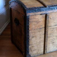 Antique Victorian pine domed trunk with iron straps and timber knock bars, circa 1880