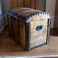 Antique Victorian pine domed trunk with iron straps and timber knock bars, circa 1880