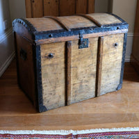 Antique Victorian pine domed trunk with iron straps and timber knock bars, circa 1880