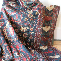 Early 20th century Persian Qashqai wool rug with indigo field, three medallions and blue-green corners, 244 × 159 cm