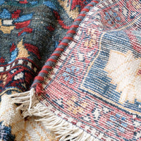 Early 20th century Persian Qashqai wool rug with indigo field, three medallions and blue-green corners, 244 × 159 cm