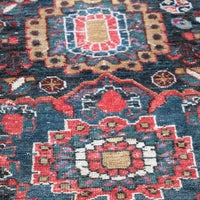 Early 20th century Persian Qashqai wool rug with indigo field, three medallions and blue-green corners, 244 × 159 cm