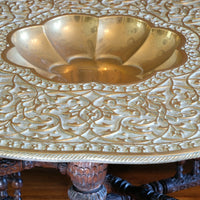 Decorative brass top with scalloped bowl on Anglo Indian table