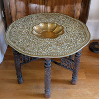 Anglo Indian folding table with brass top and carved legs