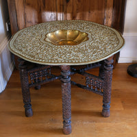 Anglo Indian folding table with brass top and carved legs