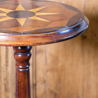 Antique Victorian mahogany tripod wine table with parquetry inlaid top and three lower rests