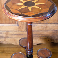 Antique Victorian mahogany tripod wine table with parquetry inlaid top and three lower rests