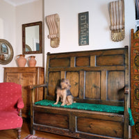 19th century Welsh oak panelled hall settle with storage and green painted finish