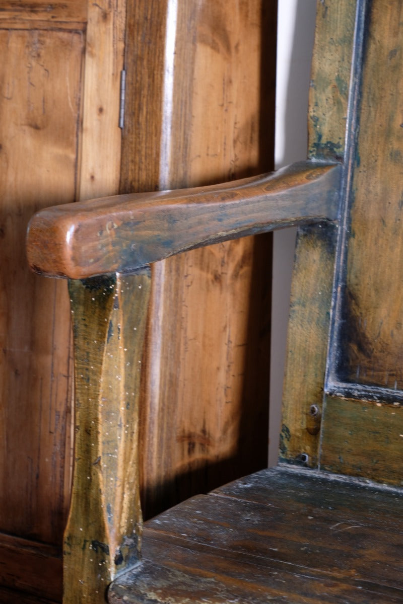 19th century Welsh oak panelled hall settle with storage and green painted finish