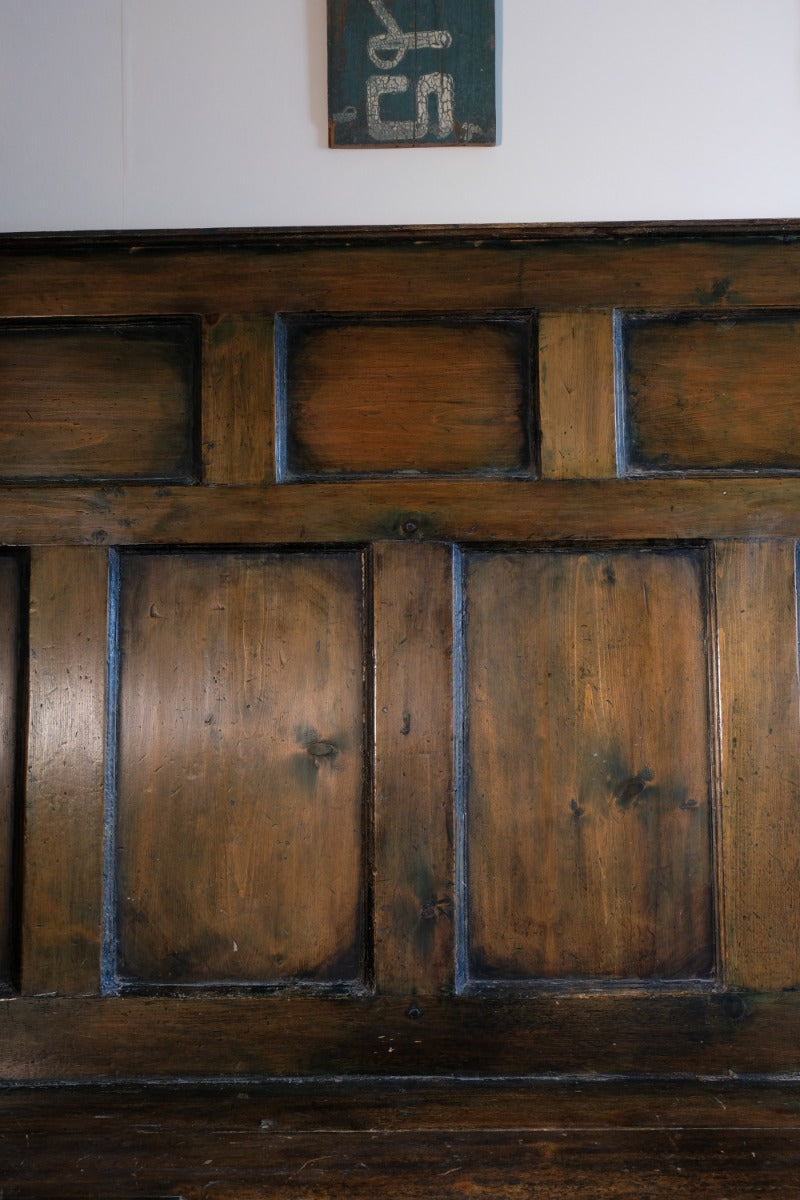 19th century Welsh oak panelled hall settle with storage and green painted finish