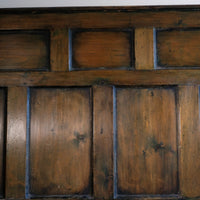 19th century Welsh oak panelled hall settle with storage and green painted finish