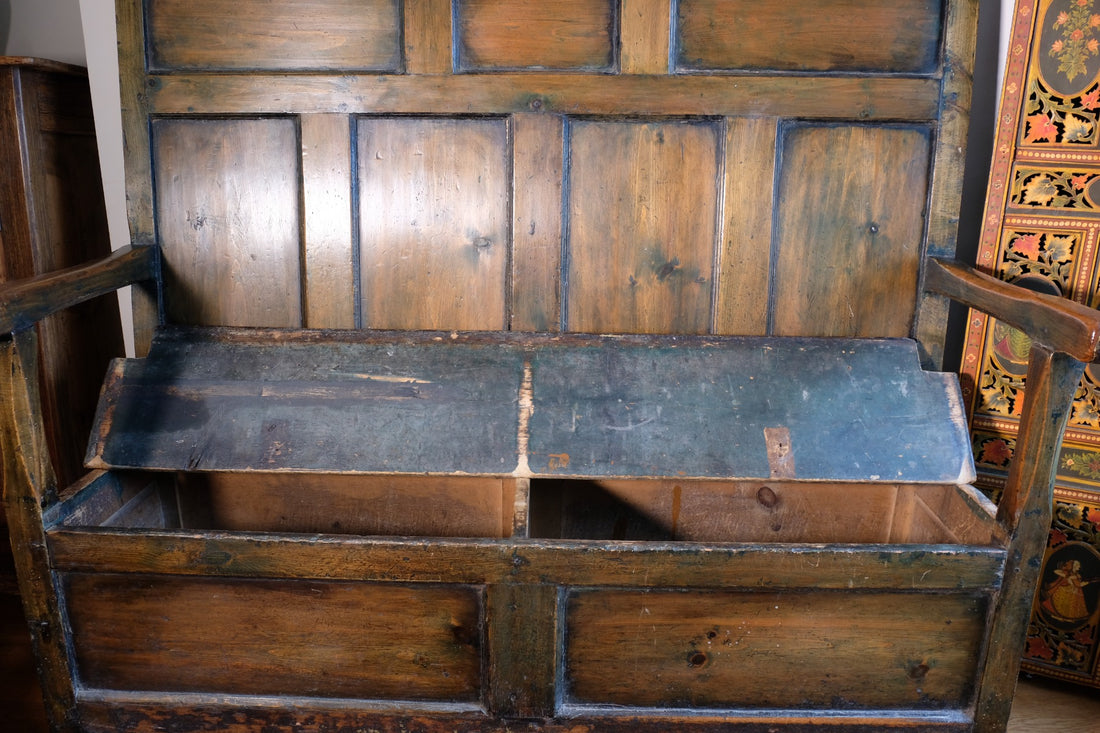 19th century Welsh oak panelled hall settle with storage and green painted finish