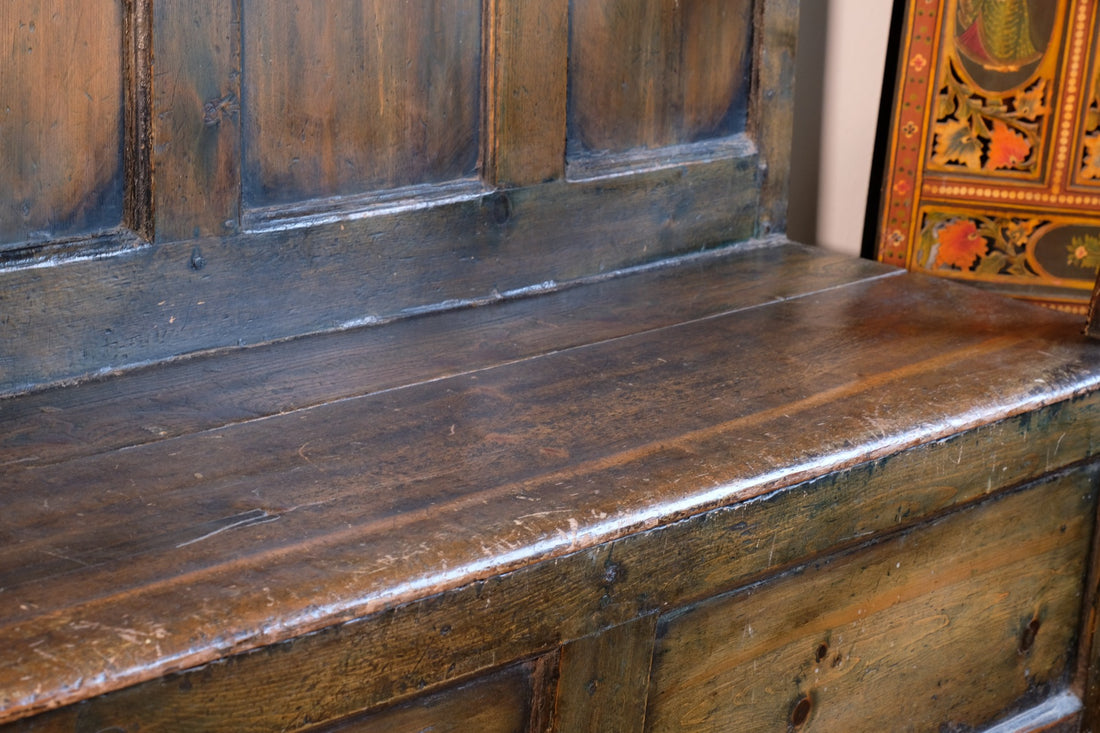 19th century Welsh oak panelled hall settle with storage and green painted finish