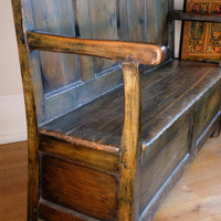 19th century Welsh oak panelled hall settle with storage and green painted finish