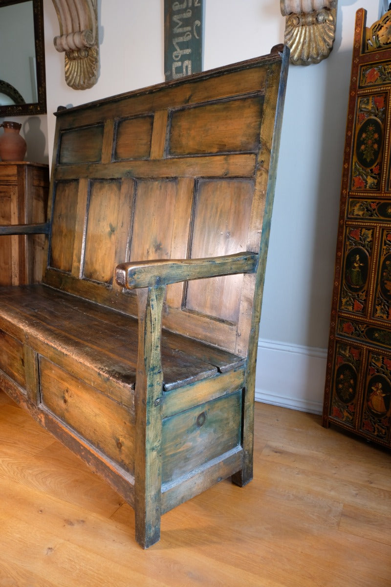 19th century Welsh oak panelled hall settle with storage and green painted finish