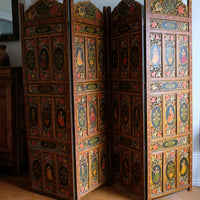 Hand-painted 19th century European folk art room divider with floral motifs and fretwork panels