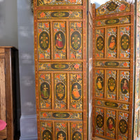 Hand-painted 19th century European folk art room divider with floral motifs and fretwork panels