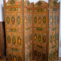 Hand-painted 19th century European folk art room divider with floral motifs and fretwork panels