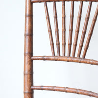 Regency faux bamboo painted chair with rattan seat and sunburst back, circa 1820