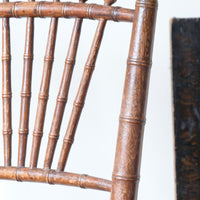 Regency faux bamboo painted chair with rattan seat and sunburst back, circa 1820