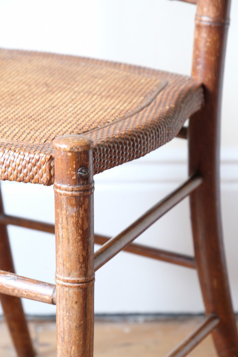 Regency faux bamboo painted chair with rattan seat and sunburst back, circa 1820