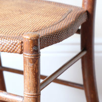 Regency faux bamboo painted chair with rattan seat and sunburst back, circa 1820