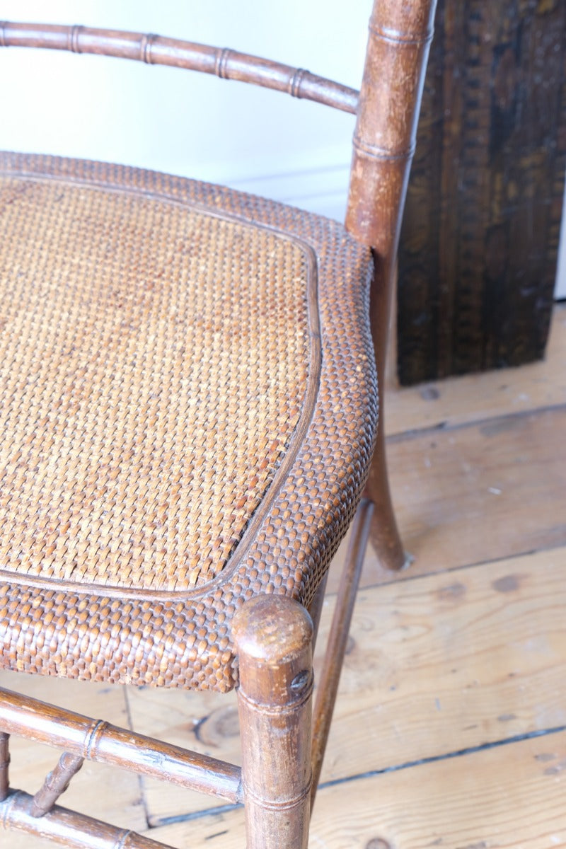 Regency faux bamboo painted chair with rattan seat and sunburst back, circa 1820