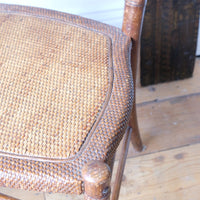 Regency faux bamboo painted chair with rattan seat and sunburst back, circa 1820
