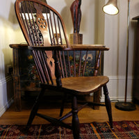 19th‑century Windsor wheelback armchair turned spindles elm seat
