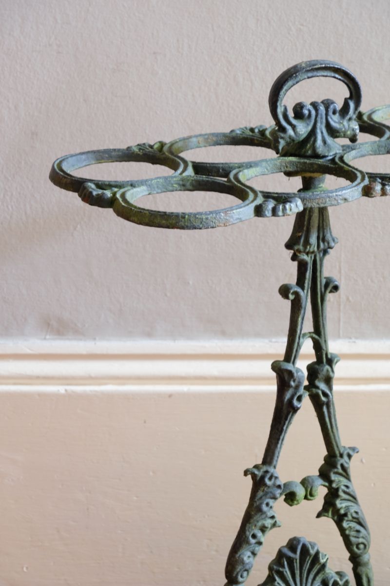 Victorian cast iron umbrella stand verdigris patina eight slots