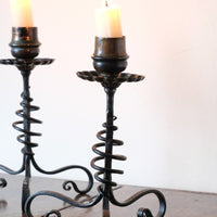 Arts & Crafts wrought iron candlesticks with copper drip trays