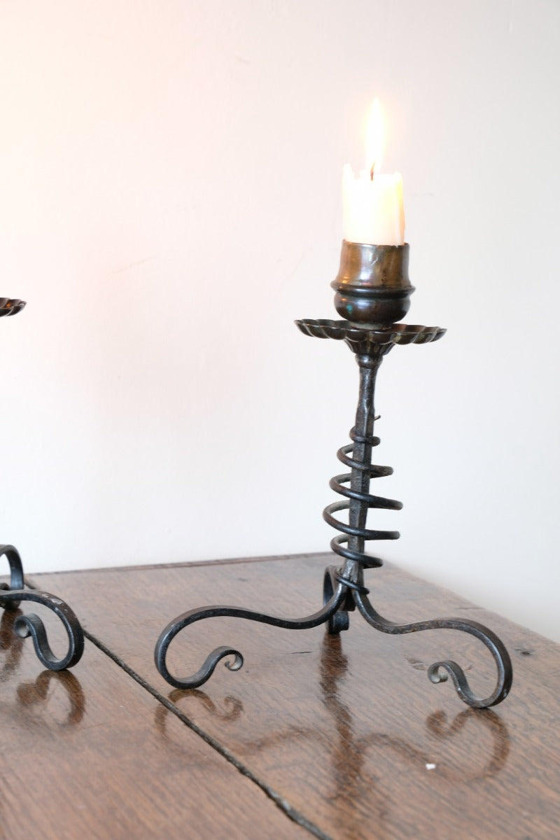 Arts & Crafts wrought iron candlesticks with copper drip trays