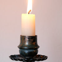 Pair of hand-forged Arts & Crafts wrought iron and copper candlesticks with spiral stems and floral drip trays