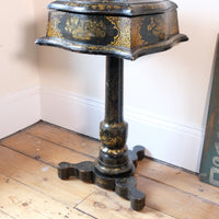 Chinoiserie Teapoy table with a serpentine sarcophagus-shaped top