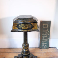 Chinoiserie Teapoy table with a serpentine sarcophagus-shaped top