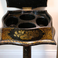 Chinoiserie Teapoy table with a serpentine sarcophagus-shaped top