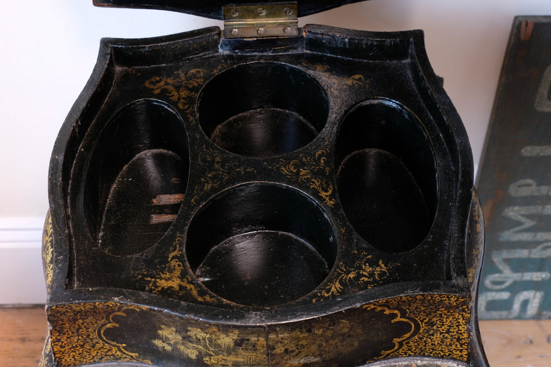 Chinoiserie Teapoy table with a serpentine sarcophagus-shaped top