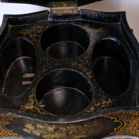 Chinoiserie Teapoy table with a serpentine sarcophagus-shaped top