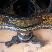 Chinoiserie Teapoy table with a serpentine sarcophagus-shaped top