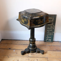 Chinoiserie Teapoy table with a serpentine sarcophagus-shaped top