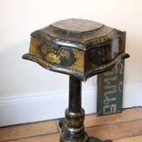 Chinoiserie Teapoy table with a serpentine sarcophagus-shaped top