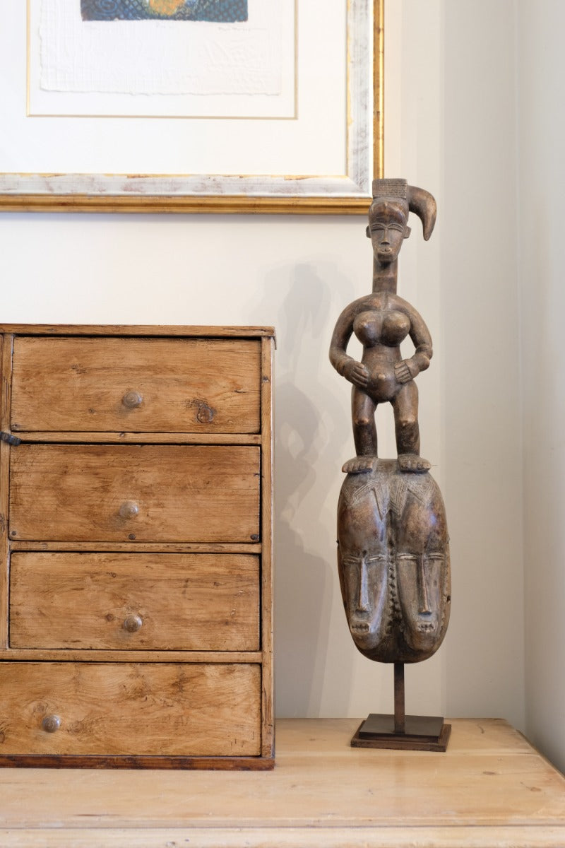 Ivorian carved Guro fertility figure used in rituals and harvest ceremonies
