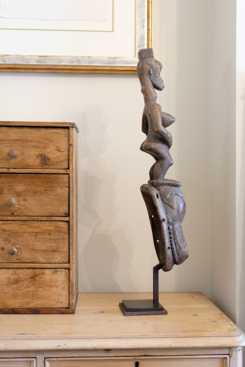 Guro fertility figure sculpture on stand Côte d’Ivoire hand‑carved wood