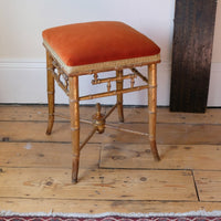 Regency giltwood faux bamboo music stool with swept out legs