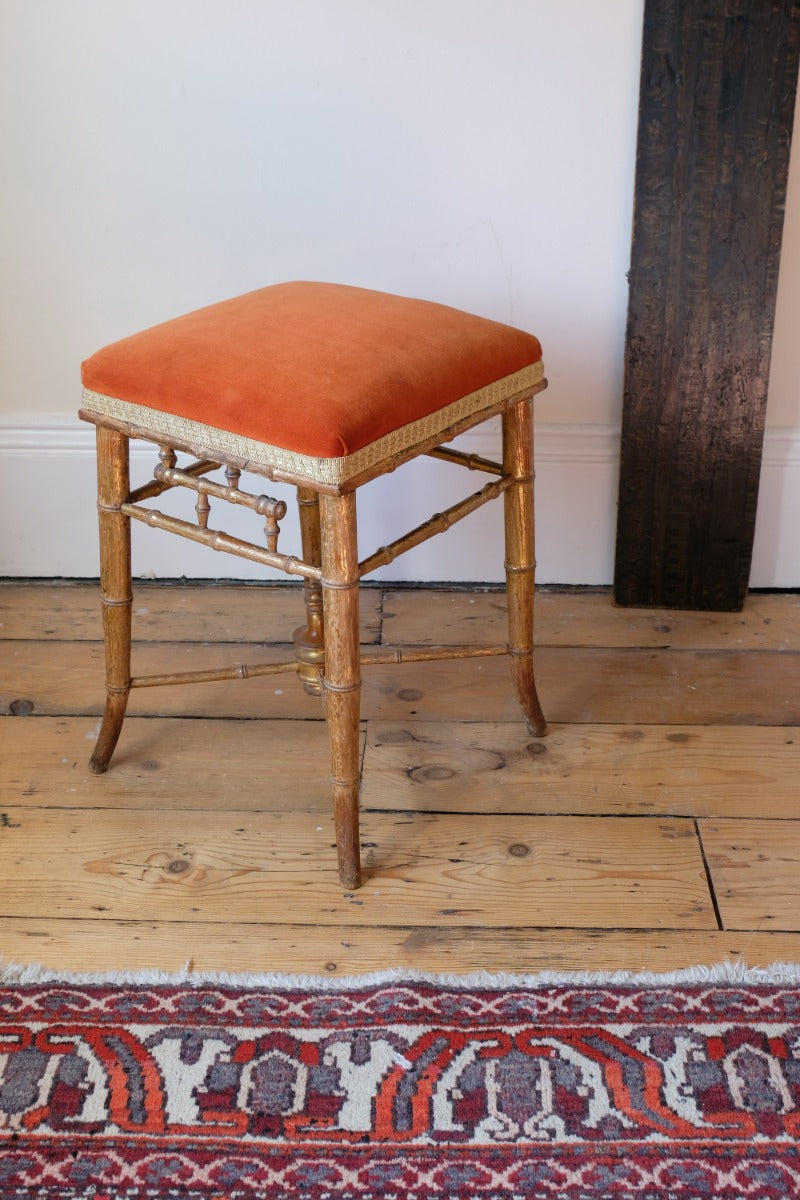 Regency giltwood faux bamboo music stool with swept out legs