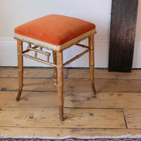 Regency giltwood faux bamboo music stool with swept out legs